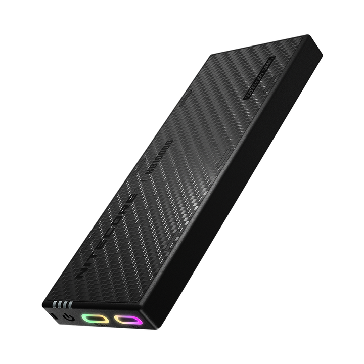Nitecore NB10000 Gen4 carbon-fiber power bank with two illuminated USB-C ports
